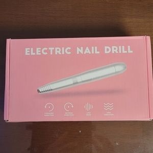 Portable electric nail drill and tons of attachments.
